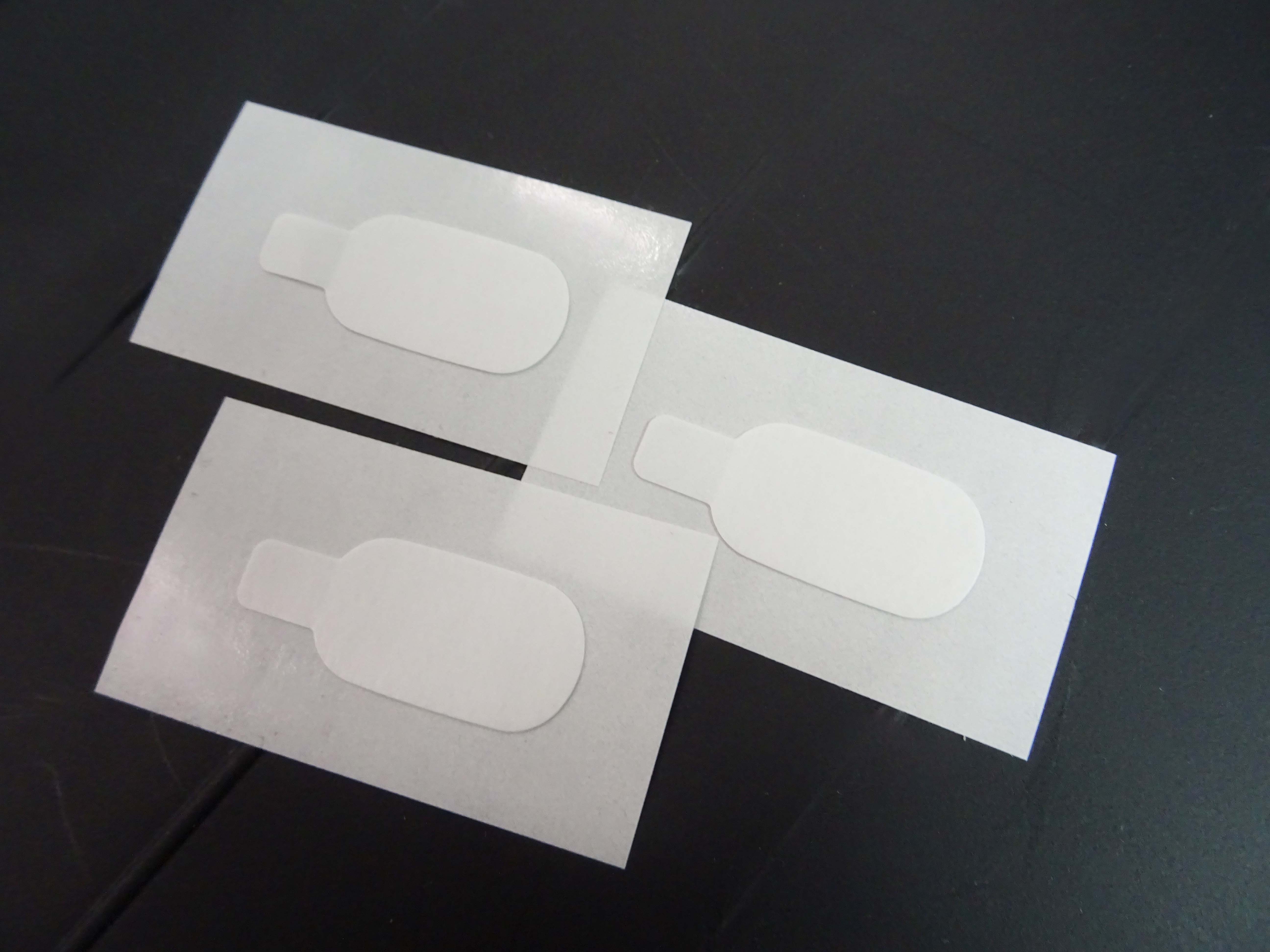 <ul><li>Double-sided adhesive solution used to attach flexible hearing aids </li></ul>